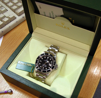 2005 steel Date Submariner, box & papers. Was a dealer "loan-watch" - no waiting