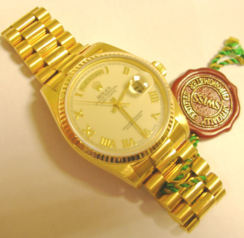 18ct gold Day-Date on President bracelet, cream dial, serviced