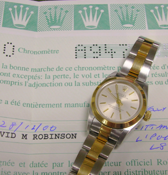December 2000 lady's Rolex Oyster Perpetual ( non-date ). Has original boxes & p