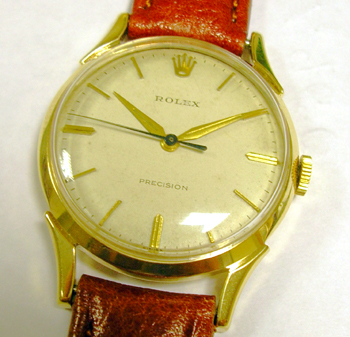 Gent's 9ct gold Rolex Precision strap watch. This is a manual wind dress watch f