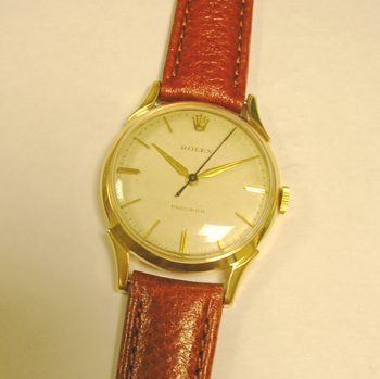 Gent's 9ct gold Rolex Precision strap watch. This is a manual wind dress watch f
