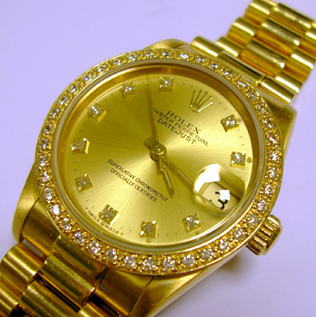 18ct midi Datejust with champagne diamond dial. Has also had a custom-made diamo