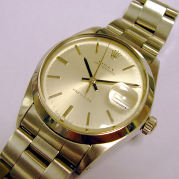 Manual wind stainless steel Oysterdate model 6694 with a silver baton dial on a 
