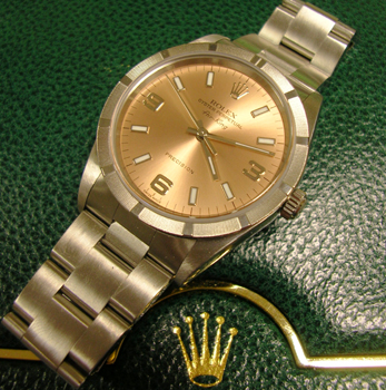 Steel Air-King model 14010M with salmon-pink 3-6-9 dial and Oyster bracelet, in 