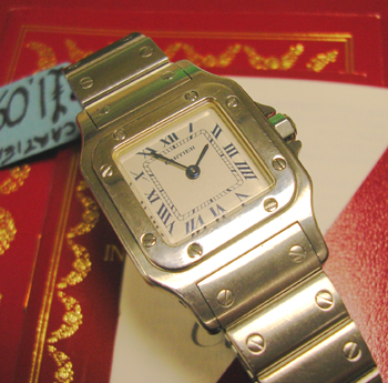 Lady's steel <b>Cartier Santos</b> quartz bracelet watch, complete with booklets