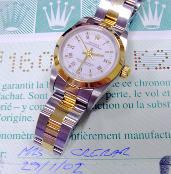 2002 Oyster Perpetual non-date with white dial, Oyster bracelet, boxex & papers.