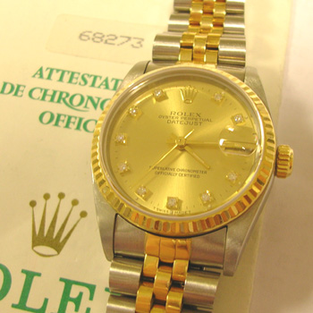Bicolour midi Datejust with original diamond dial and its original papers. <b>NE