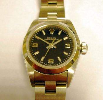 Late 1990s lady's steel Oyster Perpetual, black dial. Very reasonably priced bec