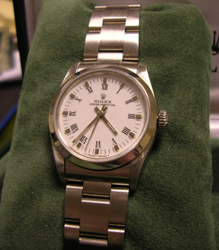 Steel Oyster Perpetual non-date model 67480, white dial on Oyster bracelet, in o