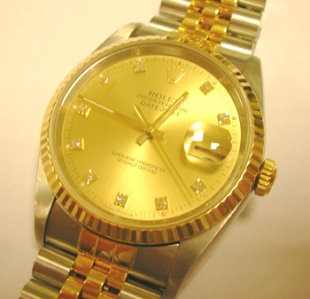 Bicolour Datejust model 16233 with champagne / diamond dot dial. Had a full move