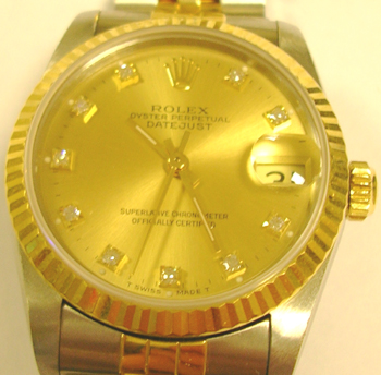 Bicolour midi Datejust with champagne / DIAMOND dial, <b>that's £1,800 less than