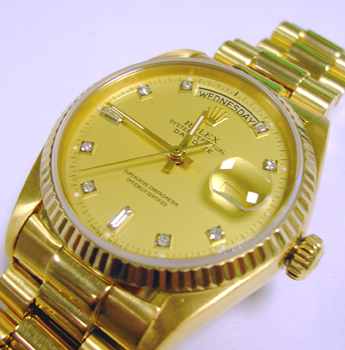 18ct gold Day-Date model 18038 with President bracelet and original champagne / 