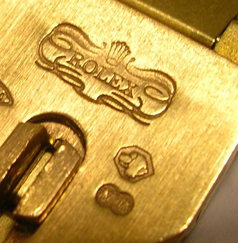 From about the year 2000 <b>genuine 18ct Rolex parts</b> featured the image of a
