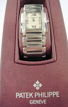 Lady's <b>Patek Philippe</b> diamond-set "Twenty-Four" model with boxes, papers,