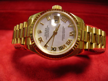 2003 18ct lady's Datejust with Mother-of-Pearl dial, latest model, boxed with pa