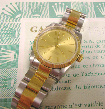 1991 mid-size bicolour with boxes, original papers & manual, champagne dial / no