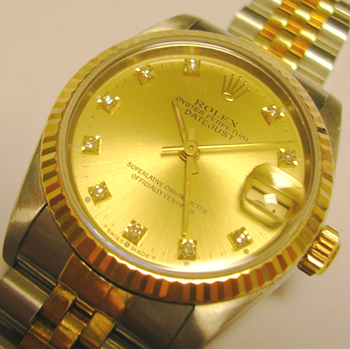Bicolour mid-size Datejust model 68273 with <b>champagne / DIAMOND dot dial</b>