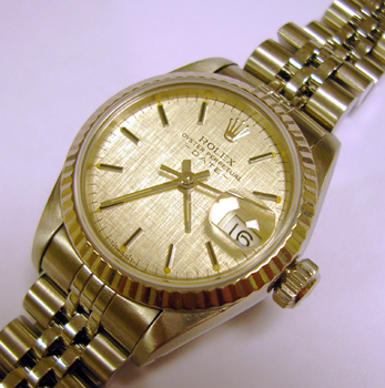 Lady's steel / white metal Date model 69174 with silver dial. We have spent over