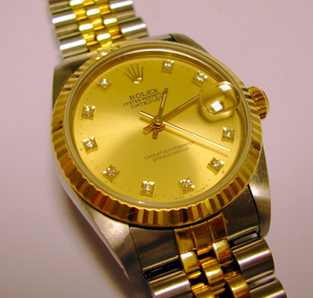 Bicolour Datejust with champagne / DIAMOND dot dial, Jubilee bracelet. Nearly £2