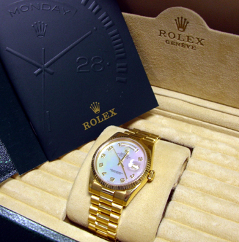 NEW MODEL Day-Date in 18ct gold (ref 118238) with original Mother-of-Pearl dial 
