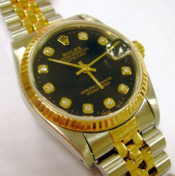 Bicolour Datejust with a custom-made <b>black / diamond dot dial</b> (not by Rol
